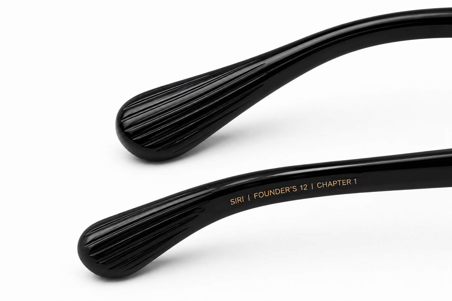 Close-up of the temple tip on the Almasi Nera™ premium optical frame.